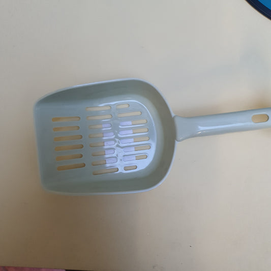 Pala para arena de gato