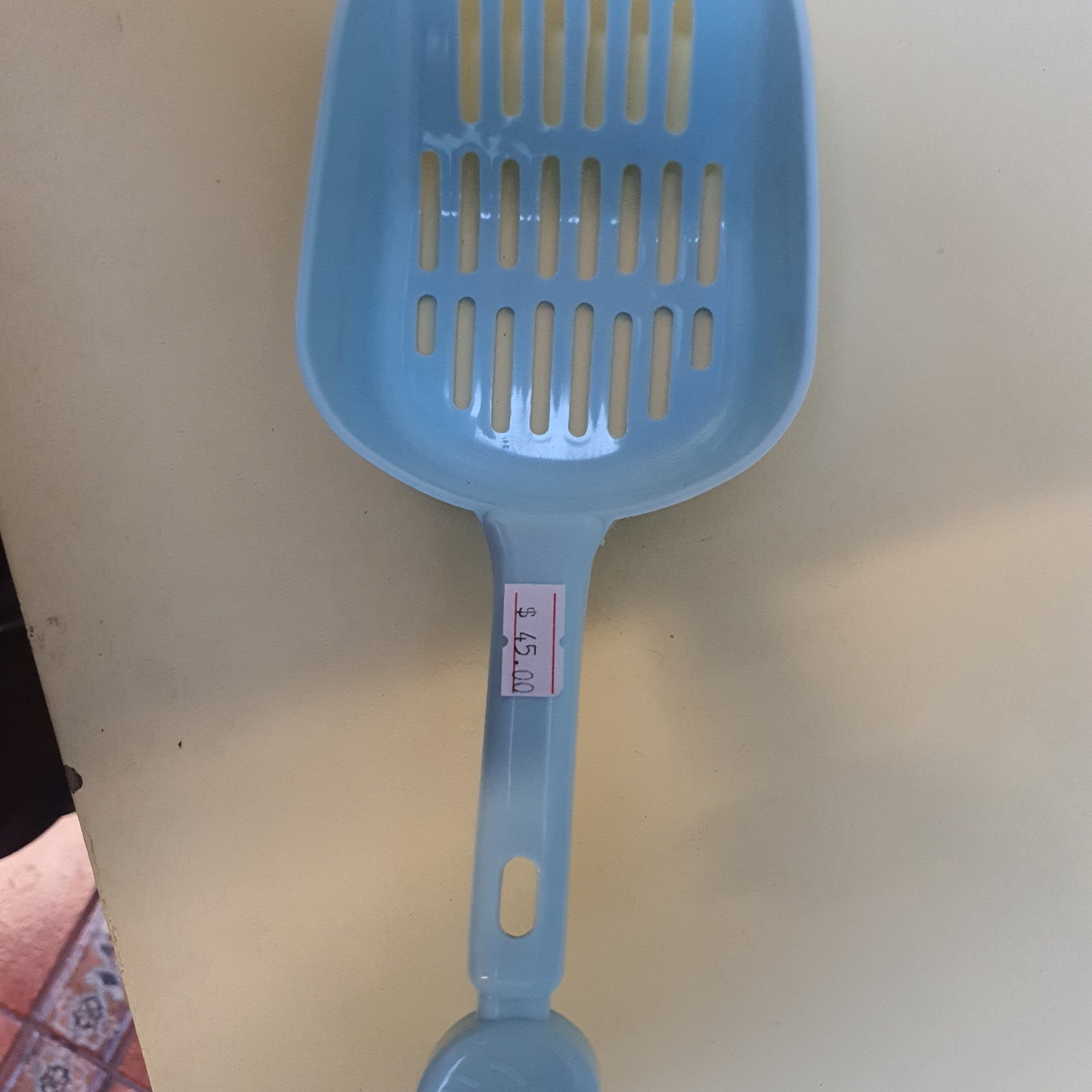 Pala para arena de gato