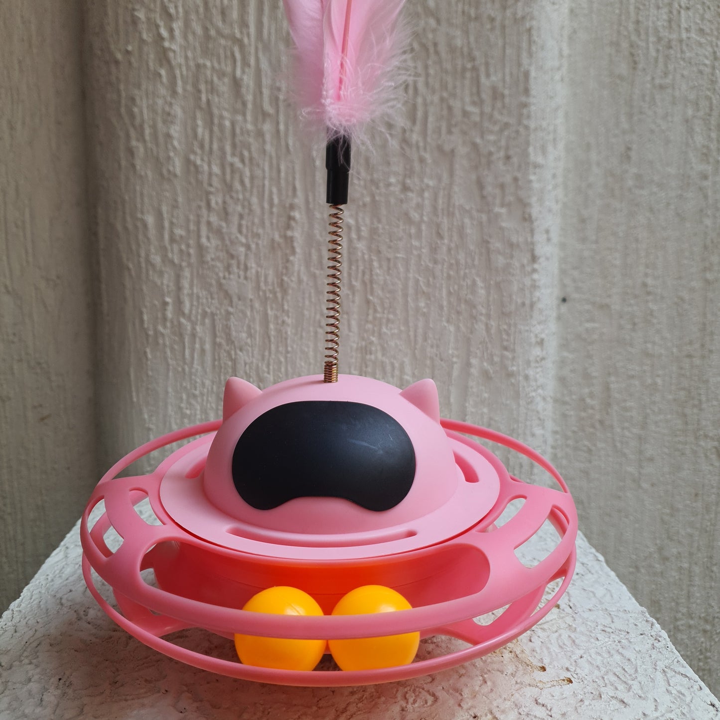 juguete movil para gato color rosa